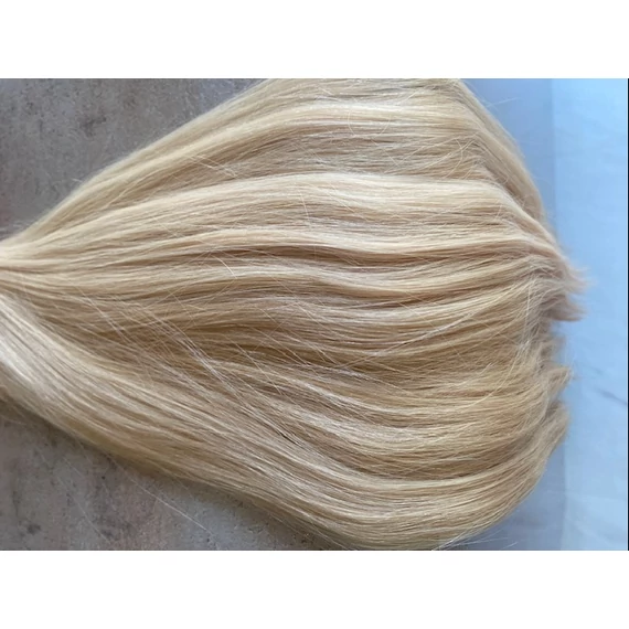 Festett bézs 100% emberi hajból készült csatos haj kb. 110-115gr, 60 cm