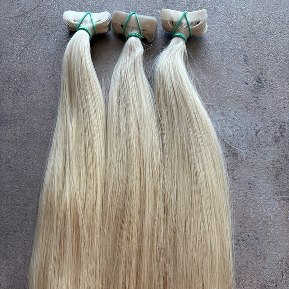 Hamvas platina szőke tape-in (ragasztócsíkos) eredeti haj 60-65 cm/1pár (2db)